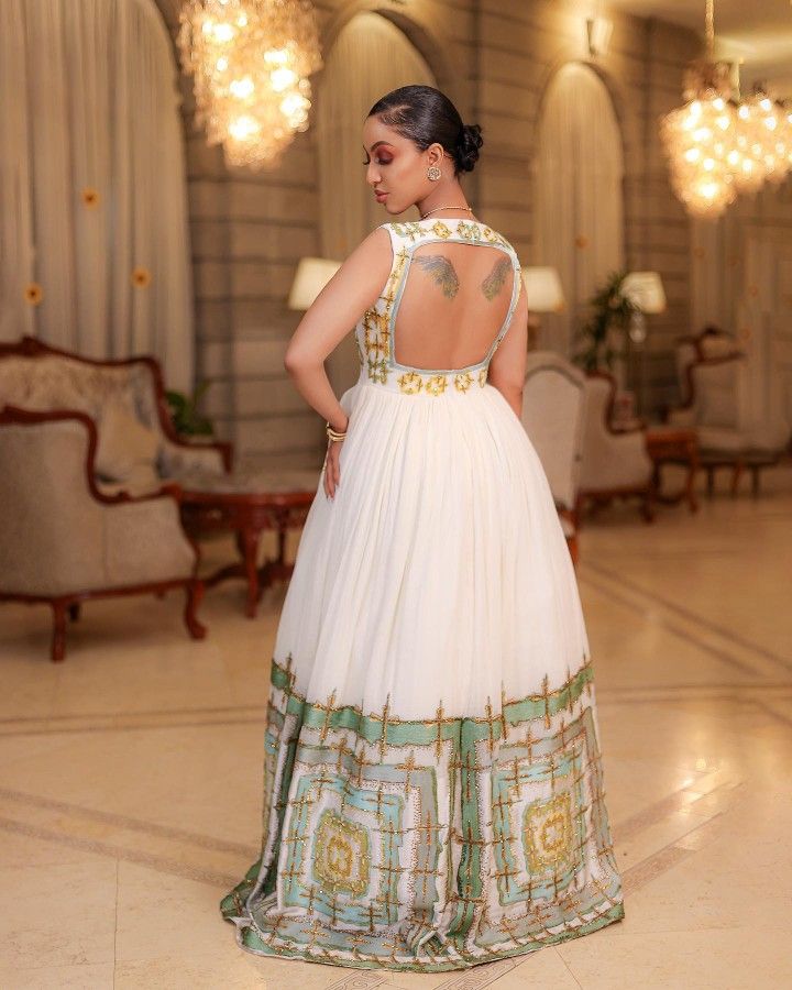 Habesha Kemis - Ivory Wedding Dress with green Handwoven Design Habesha Dresses Store Habesha Kemis - Ivory Wedding Dress with green Handwoven Design Habesha Dresses Store
