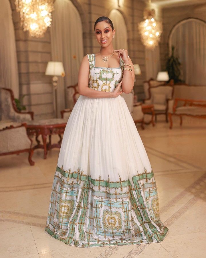 Habesha Kemis - Ivory Wedding Dress with green Handwoven Design