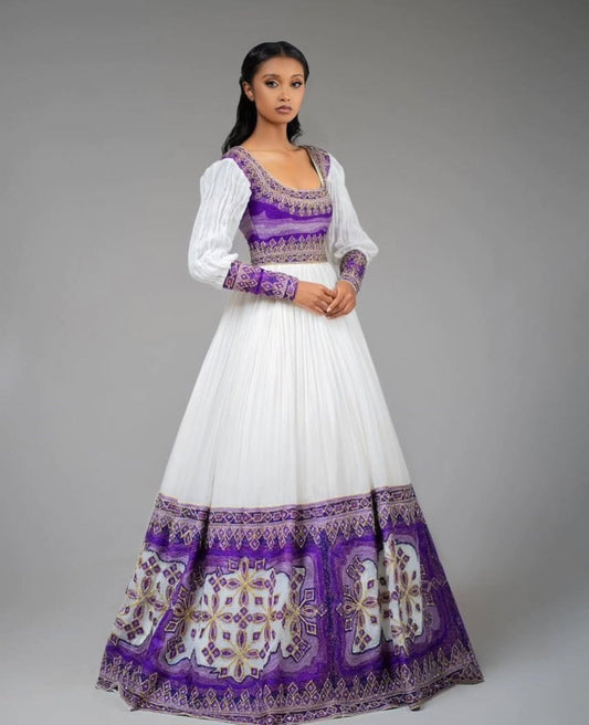 Regal White Habesha Kemis – Ethiopian Traditional Dress with Purple & Gold Embroidery Bezawit