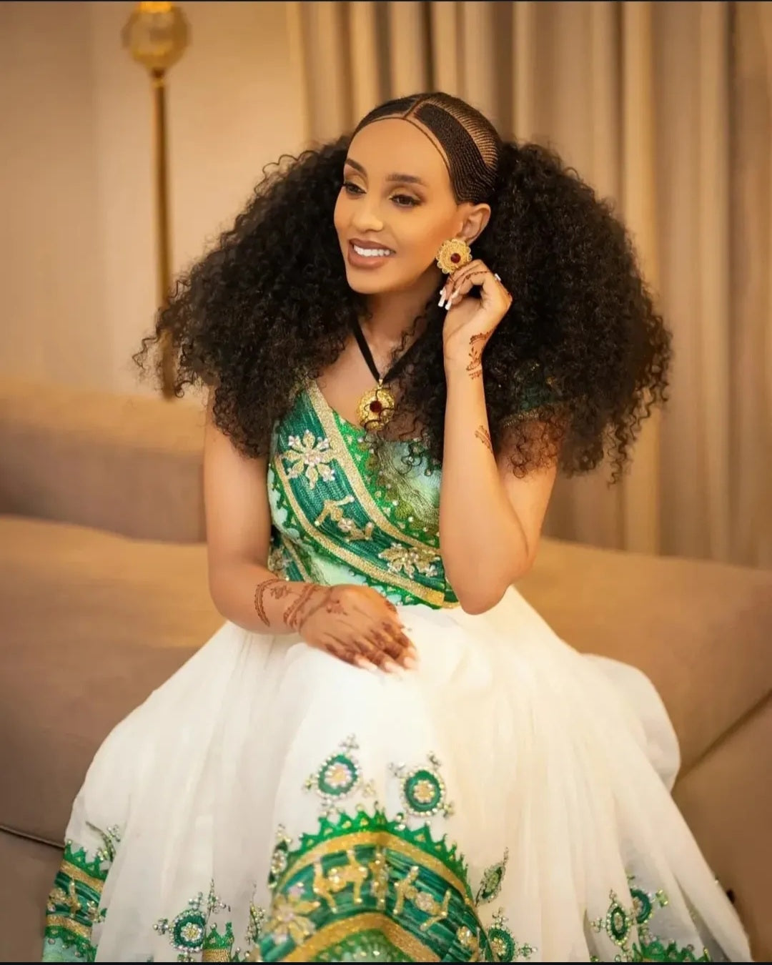 stunning Green & Gold Two-Piece Habesha Dress with Elaborate Embroidery
