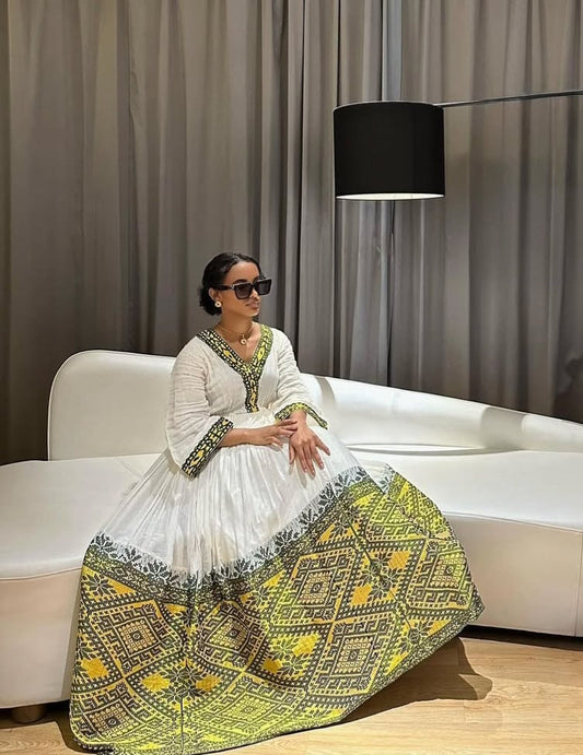 Sunshine Elegance: Modern Habesha Dress with Vibrant Yellow Motifs Bezawit