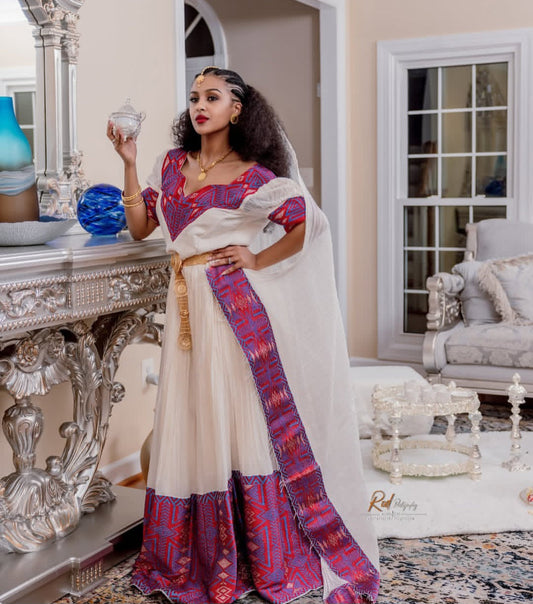 Royal Bloom: Exquisite Habesha Dress with Purple & Gold Bezawit