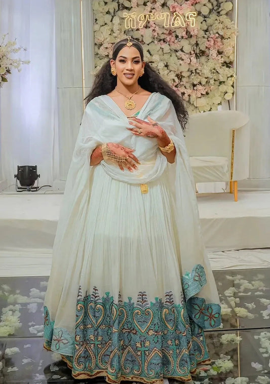 Fresh White & Bright Blue Eritrean Dress with Rich Patterns Bezawit