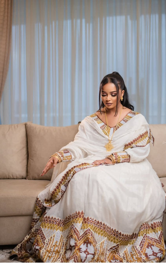 Majestic Habesha Kemis: Traditional Ethiopian Elegance in Gold & White Bezawit
