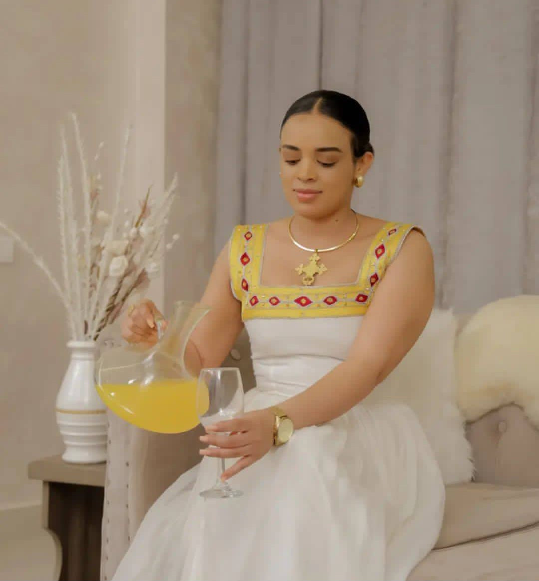 Modern Habesha Dress - White Ethiopian Attire with Yellow & Red Geometric Trim Bezawit