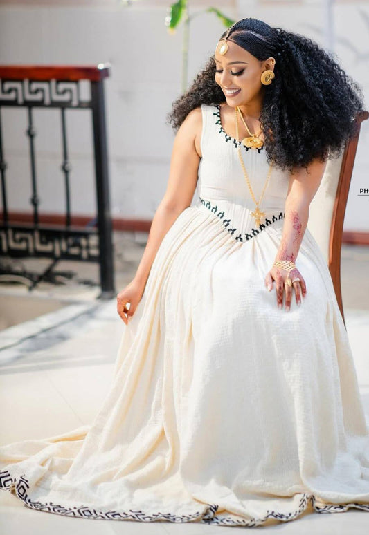 Elegant White Habesha Dress - Sleeveless Ethiopian Kemis with Black Trim Bezawit