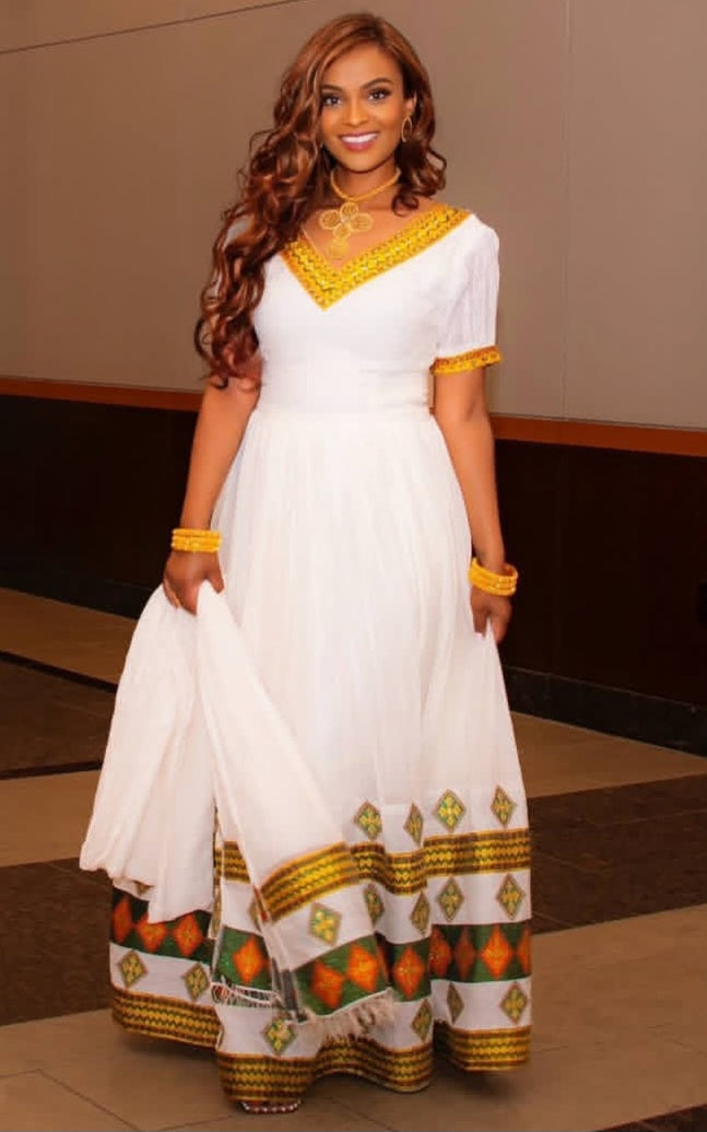 Striking Habesha Dress -prominent red bodice and red border Cultural Attire Bezawit
