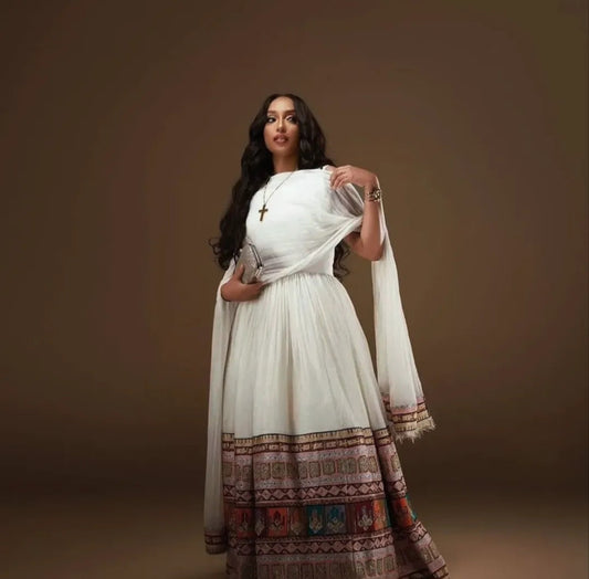 Modern White Habesha Two-Piece with Multi-Color Tibeb – Stylish Ethiopian Outfit Bezawit