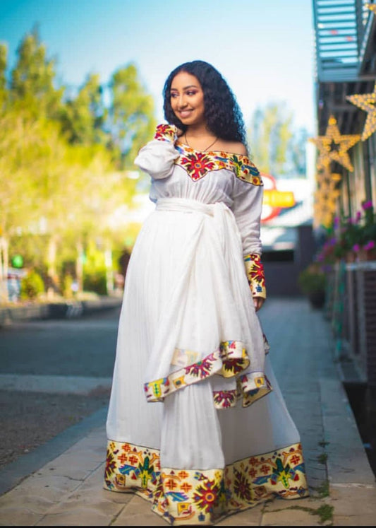 Artistic Off-Shoulder Habesha Dress - Ethiopian Kemis with Vibrant Embroidery Bezawit