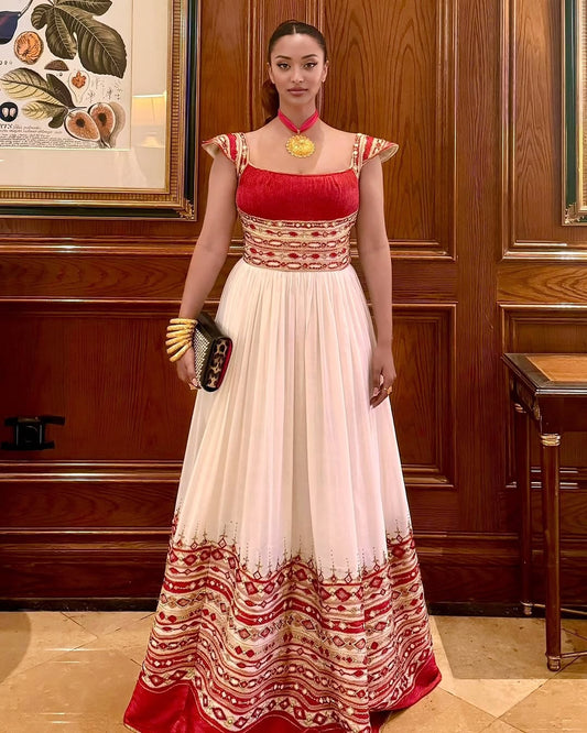 ሐበሻ ቀሚስ – በ ነጭና ቀይ ጥልፍ ያጌጠ የኢትዮጵያ ባህላዊ ልብስ