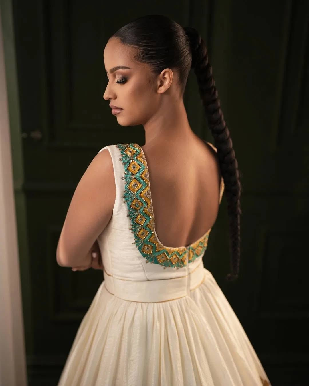 ሙሽራ ሐበሻ ልብስ | ወርቃማና አረንጓዴ በእጅ የተሰራ የሠርግ ልብስ