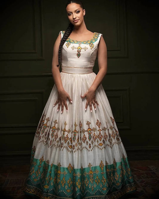 ሙሽራ ሐበሻ ልብስ | ወርቃማና አረንጓዴ በእጅ የተሰራ የሠርግ ልብስ