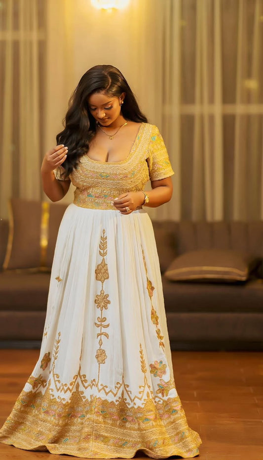 ሐበሻ ልብስ – በደማቅ ወርቃማ ጥልፍ ለመስቀል በዓል