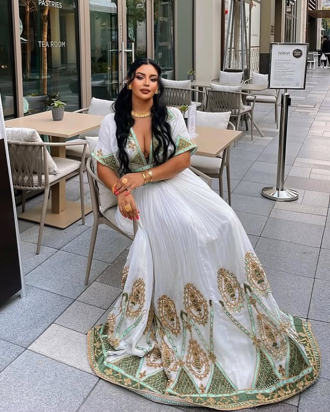 Luxury Emerald Green Habesha Libs: Elegant Embroidered Masterpiece