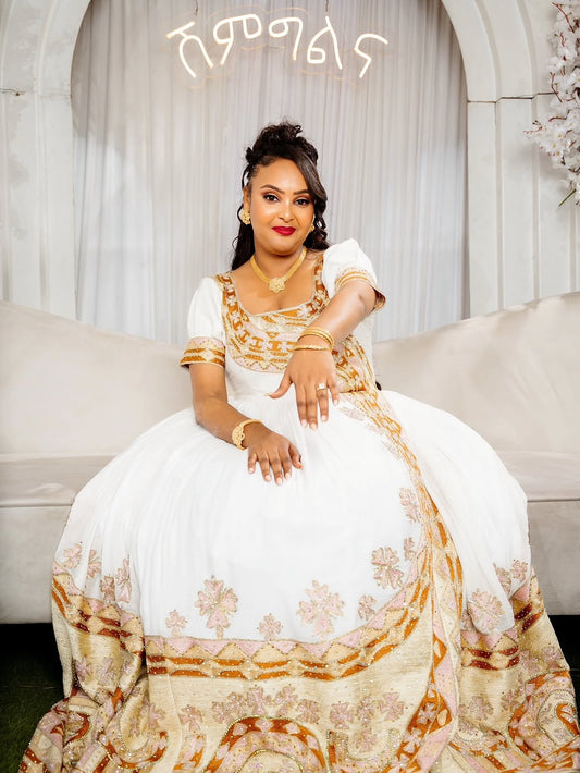 Habesha Kemis – Ivory Cotton Wedding Dress with Gold Embroidery