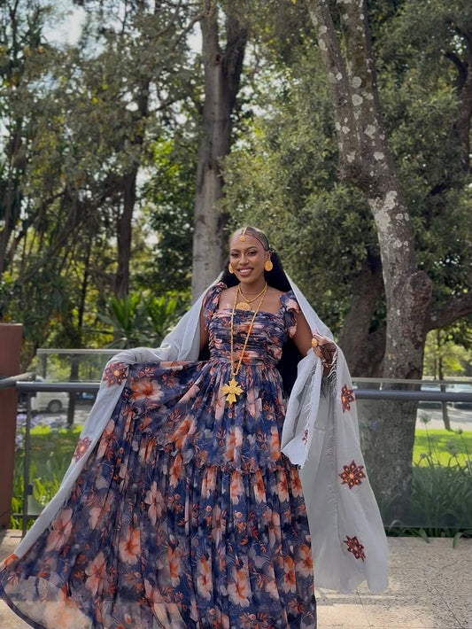 Woman in a Purple Habesha Shiffion with a light shawl outdoors