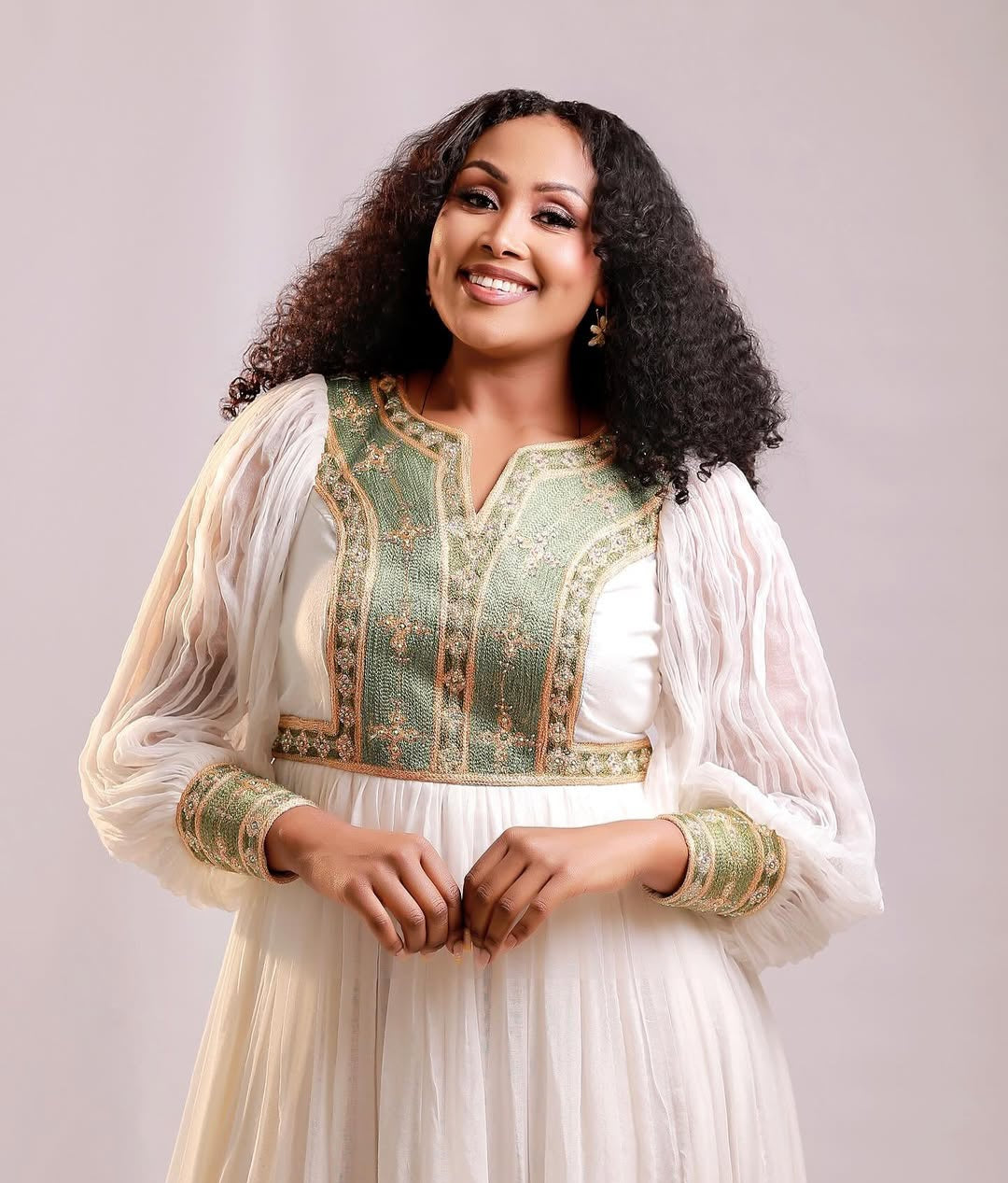 የሐበሻ ቀሚስ | ጥሬ ኮተን በአረንጓዴ እና ብር የተሠራ ሐበሻ ልብስ
