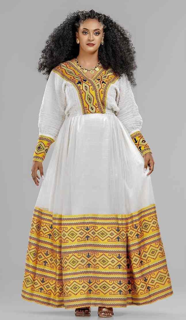 Ethiopian Cultural Dress with Artistic Hem Patterns- Modern Zuria with Gold Borders Bezawit