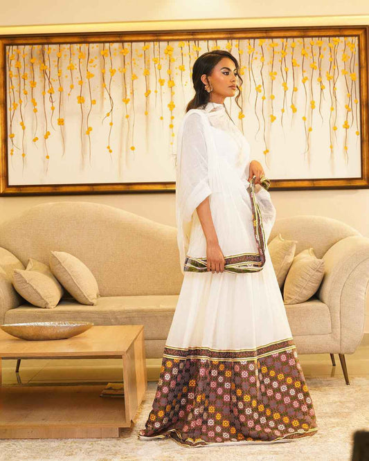 Handmade Flowing Habesha Dress – White Ethiopian Attire with Embroidered Border for graduation Bezawit