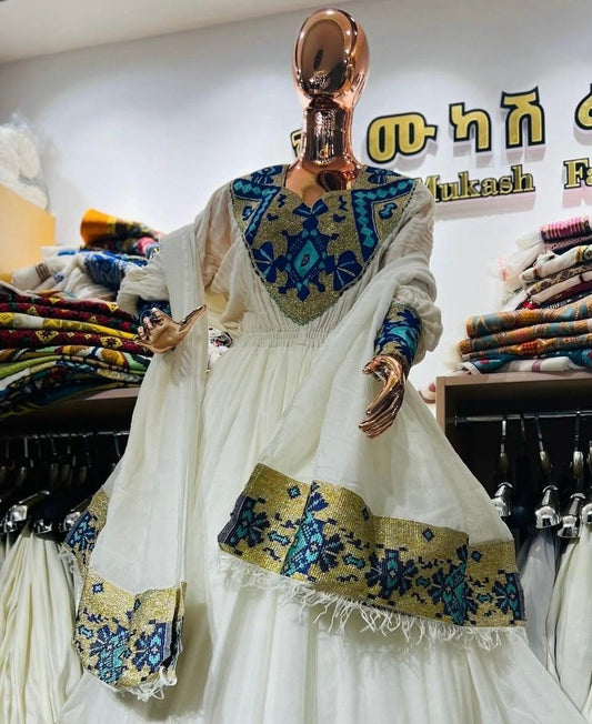 Graceful Blue and Gold Zuria - Modern Habesha Dress with Embroidery