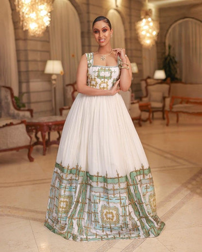 Habesha Kemis - Ivory Wedding Dress with green Handwoven Design