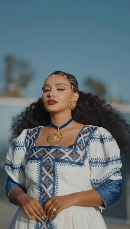 Unique White Habesha Dress by Liya Fetil – Blue Tilet Art & Gonder Faldas Cross Embroidery