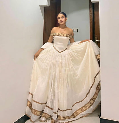 Off-Shoulder Modern Ethiopian graduation dress - in Cream and Gold Habesha Dresses Store Off-Shoulder Modern Ethiopian graduation dress - in Cream and Gold Habesha Dresses Store