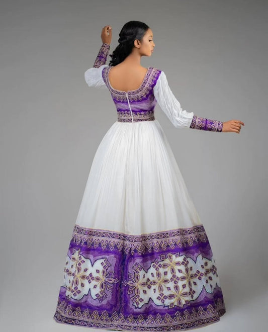 Regal White Habesha Kemis – Ethiopian Traditional Dress with Purple & Gold Embroidery