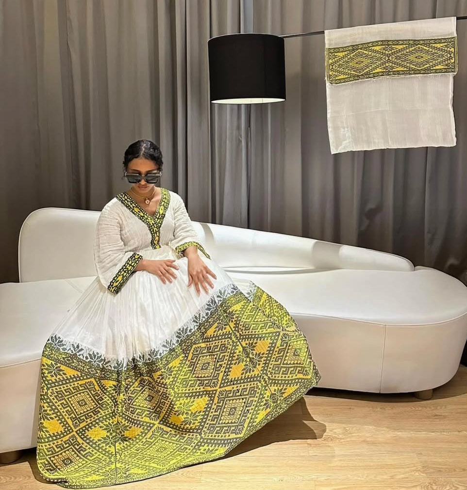 Sunshine Elegance: Modern Habesha Dress with Vibrant Yellow Motifs Bezawit