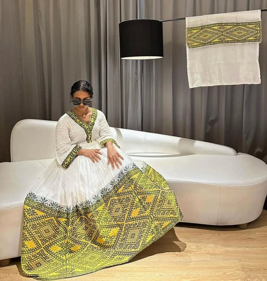 Sunshine Elegance: Modern Habesha Dress with Vibrant Yellow Motifs Bezawit