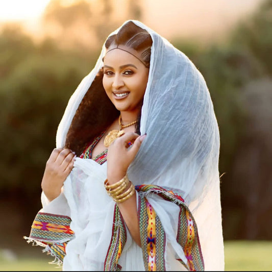 Graceful Serenity: Traditional Habesha Dress with Rich Embroidery