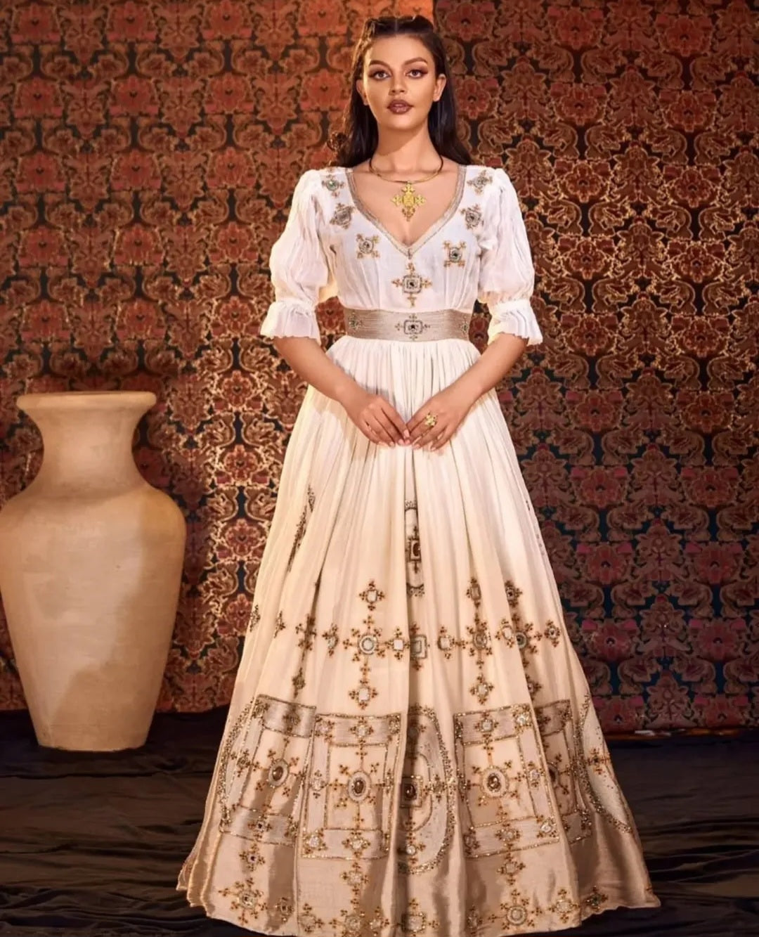 Golden Glamour: Elegant Ethiopian Dress with Intricate silver Detailing Bezawit