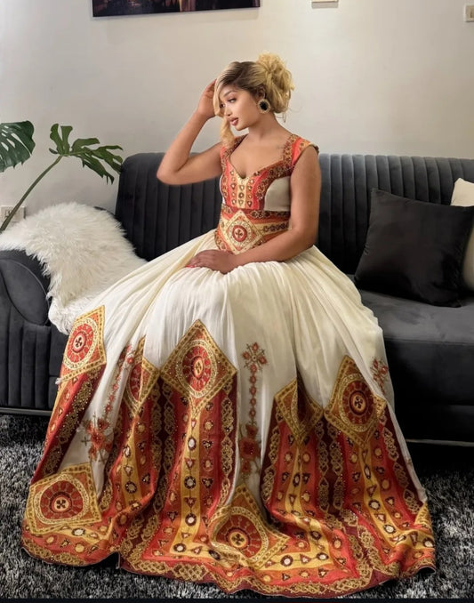 Opulent Ivory & Gold Ethiopian Dress with Grand Skirt and Intricate Details