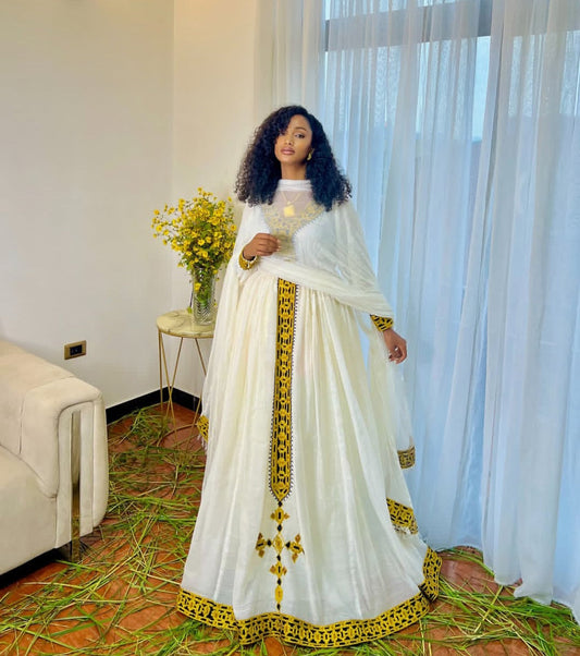 Golden Radiance: Elegant Modern Habesha Dress with Yellow Accents Bezawit