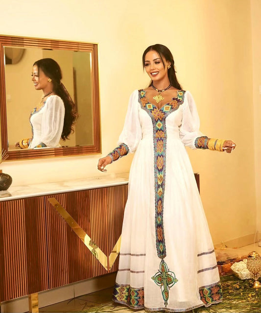 Elegant White Habesha Kemis - Modern Ethiopian Dress with Gold & Blue Embroidery Bezawit