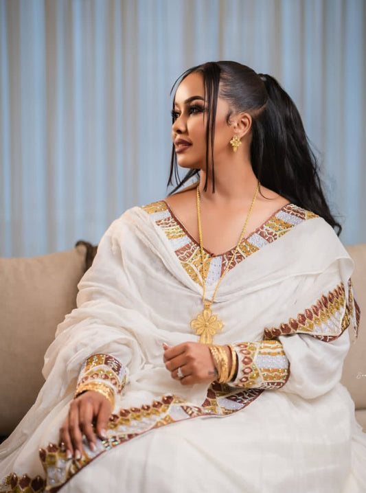 Majestic Habesha Kemis: Traditional Ethiopian Elegance in Gold & White