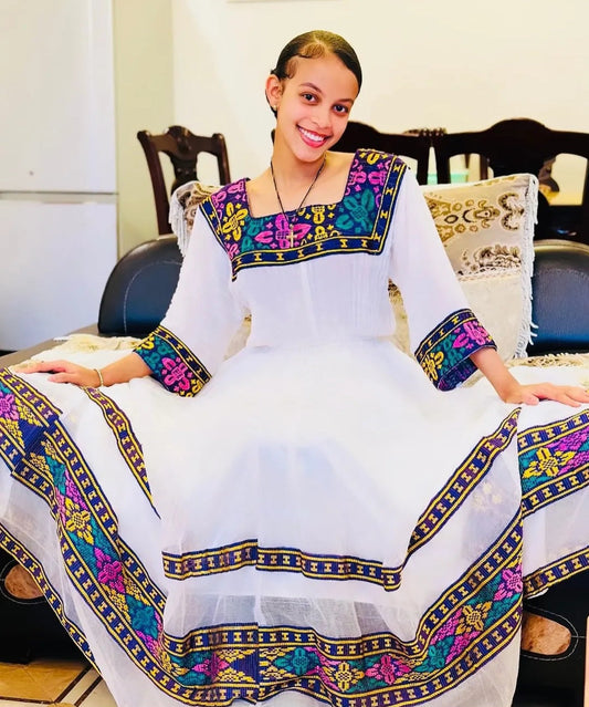 Traditional Ethiopian Attire with Vibrant Tilet - Elegant Habesha Dress for Women Bezawit