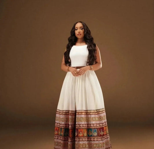 Modern White Habesha Two-Piece with Multi-Color Tibeb – Stylish Ethiopian Outfit Bezawit