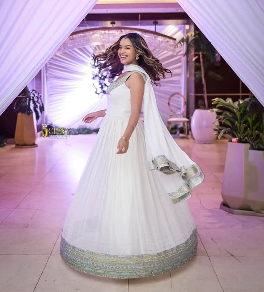 Modern Ethiopian Dress for Celebrations- Flowing White Habesha-Inspired Gown Bezawit