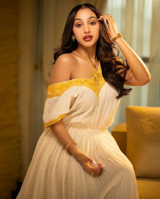 Habesha Kemis - White Cotton with yellow tibeb Borders