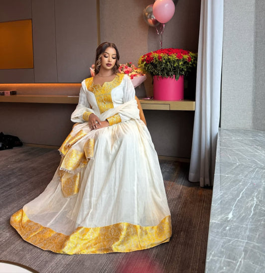 Habesha Dress – Elegant White Cotton with Gold Borders for Church Celebrations