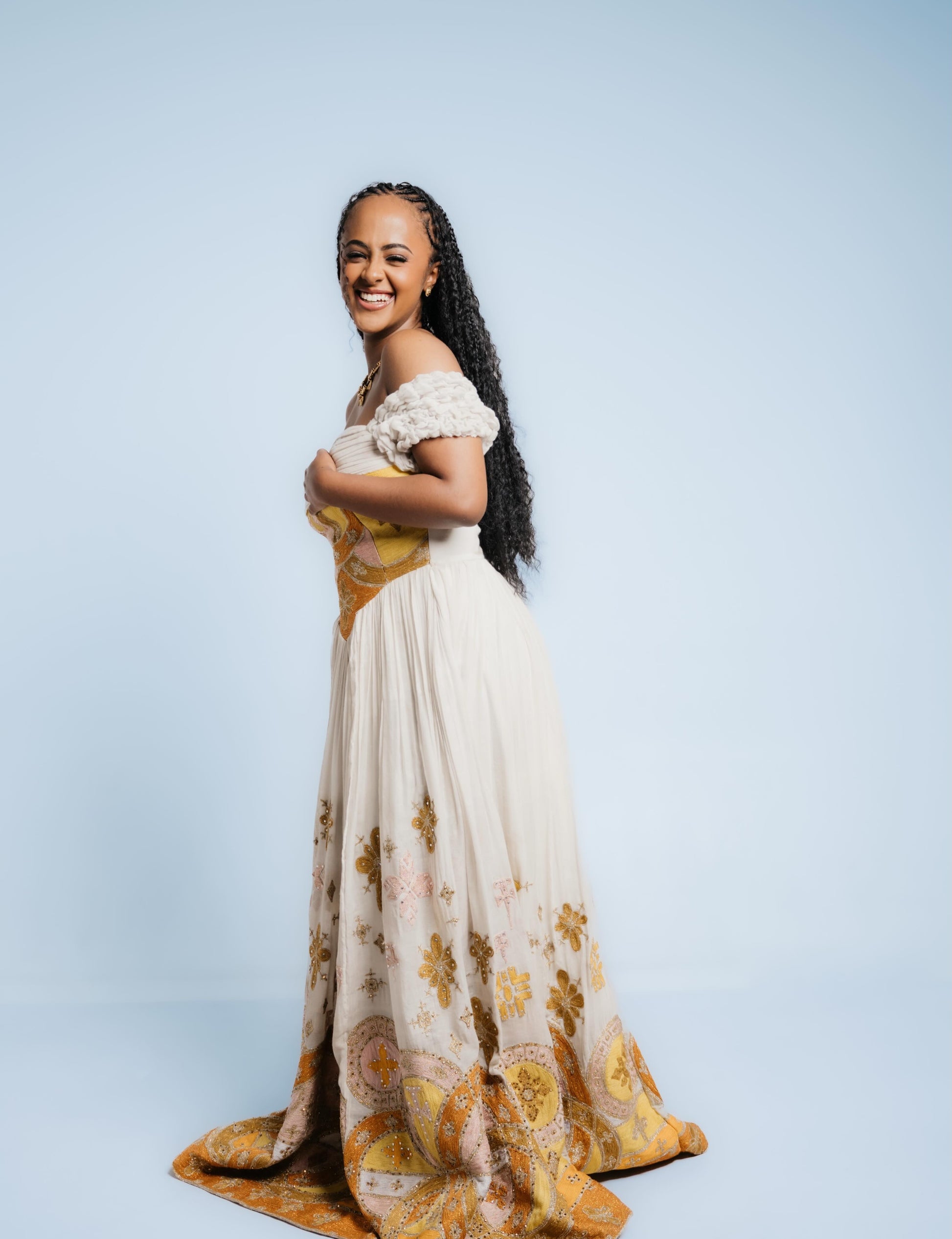 Gold Habesha dress in handwoven cotton featuring tilf embroidery for W – Habesha Dress Store