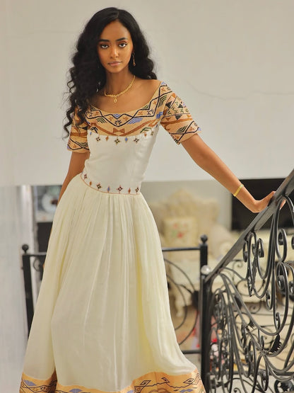 Gold Habesha Libs – Luxury Ethiopian Traditional Dress with Bold Tibeb Design for Wedding Ceremonies and Special Occasions