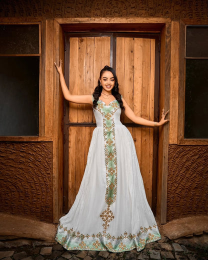 Green Ethiopian dress for women at Enkutatash celebrations with a bright color and flowing silhouette