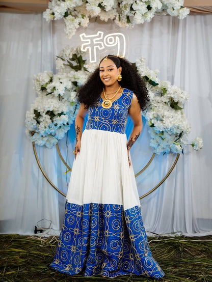 Habesha Dress – White Cotton with bold Blue Borders for Engagement Party