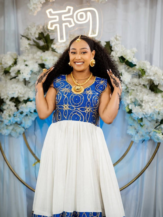 Habesha Dress – White Cotton with bold Blue Borders for Engagement Party