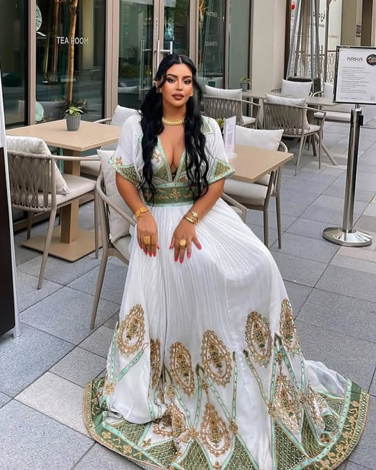 Luxury Emerald Green Habesha Libs: Elegant Embroidered Masterpiece