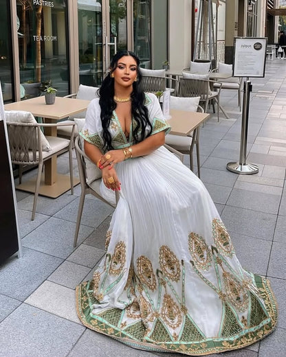 Luxury Emerald Green Habesha Libs: Elegant Embroidered Masterpiece