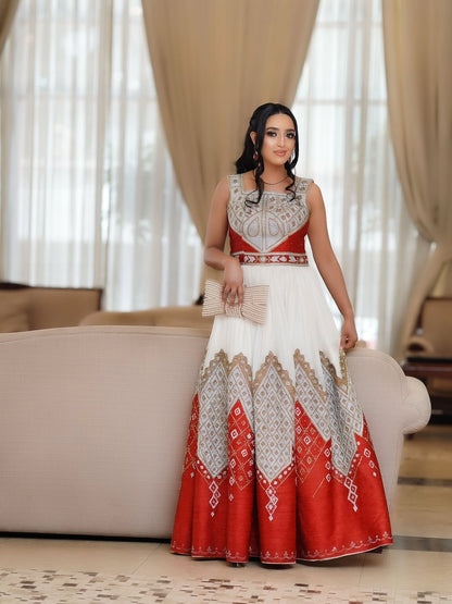 White and Red Habesha Kemis – Elegant Ethiopian Traditional Dress with Hand-Woven Tilf Embroidery and Modern Sleeveless Design