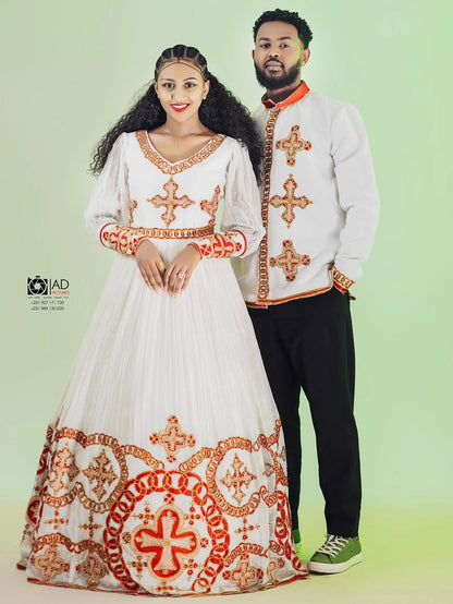 Couple wearing traditional embroidered habesha dress on a light green background